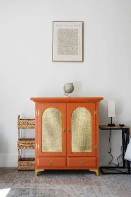 an orange cabinet in a room with a white wall at The Little Oasis in Escondido