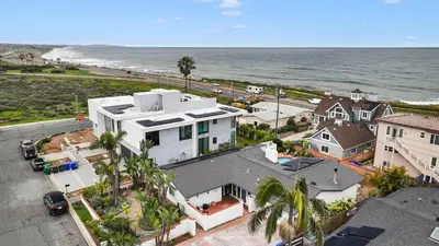 an aerial view of a house next to the ocean at Ocean View Luxury Living in Carlsbad