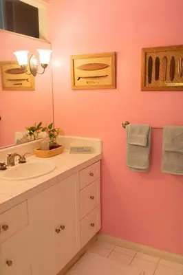 a bathroom with a sink and a mirror at La Jolla Suite with Ocean View Patio in San Diego