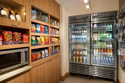 a refrigerator in a store with food and drinks at Courtyard by Marriott San Diego Gaslamp/Convention Center in San Diego