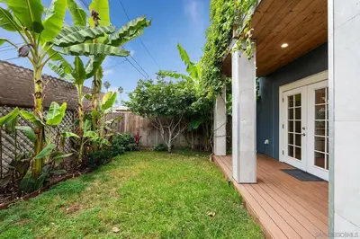 a porch of a house with a wooden deck at Oceanside Rooftop Retreat Sleeps 4 in Oceanside