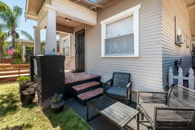 a house with two chairs and a patio at Modern Gem in North Park in San Diego