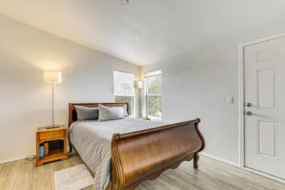 a bedroom with a bed and a window at Near Ramona Wineries Mtn-View Haven with Large Yard in Ramona