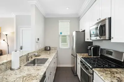 a kitchen with a sink and a stove at Newport Retreat A - Fab for 4 in Newport Beach