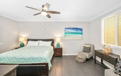 a bedroom with a bed and a ceiling fan at Newport Retreat A - Fab for 4 in Newport Beach