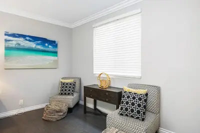 a room with two chairs and a desk and a window at Newport Retreat A - Fab for 4 in Newport Beach