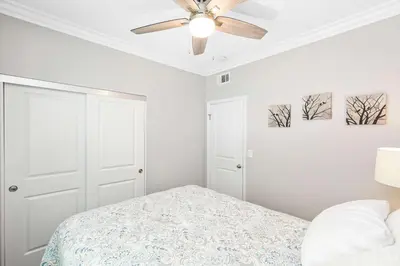 a bedroom with a ceiling fan and a bed at Newport Retreat A - Fab for 4 in Newport Beach