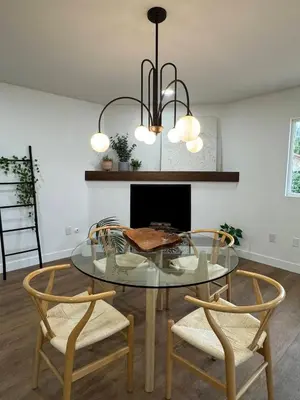 a dining room with a glass table and two chairs at Bella Vista Spacious 5-bed home with stunning mountain views and pool in Vista