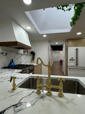 a kitchen with gold faucets on a sink at Bella Vista Spacious 5-bed home with stunning mountain views and pool in Vista