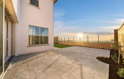 a house with a patio with a view of the ocean at Hidden Gem New 4B3B House UCI Disney Amazing view in Irvine