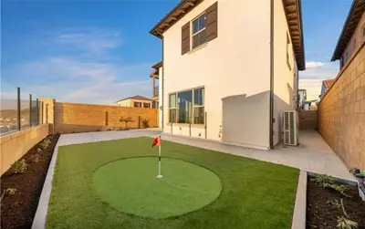 a golf course in the backyard of a house at Hidden Gem New 4B3B House UCI Disney Amazing view in Irvine