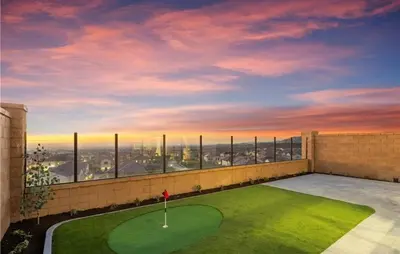 a golf course on the roof of a building at Hidden Gem New 4B3B House UCI Disney Amazing view in Irvine