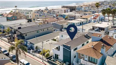 an aerial view of a city with the ocean at Coastal-Chic Newport Stay Steps to the Beach Dining Boardwalk Optional Add-On Unit in Newport Beach