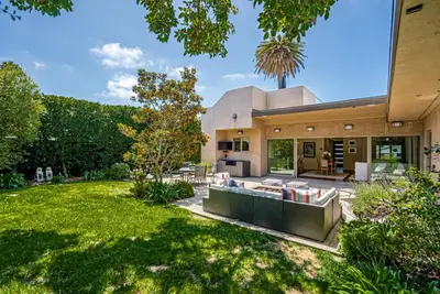 an exterior view of a house with a yard at La Jolla 3BR Oceanview Deck in San Diego