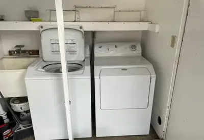a white washer and dryer in a small room at Ocean Views Walk to the Beach with King Suite in Encinitas