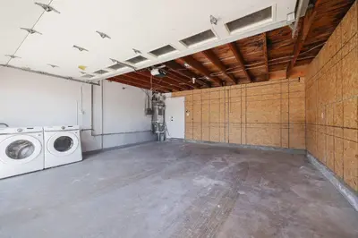 a laundry room with a washer and dryer in it at 4 Miles to Beach Central and Newly Renovated in San Diego
