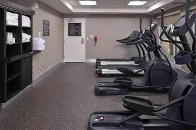 a row of treadmills in a gym at Residence Inn by Marriott Temecula Murrieta in Murrieta