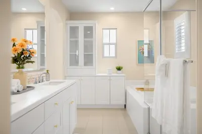 a white bathroom with white cabinets and a sink at Modern Elegant Designer Home in Irvine in Irvine