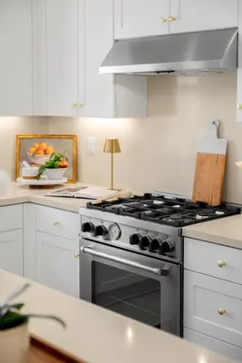 a kitchen with a stove and a bowl of fruit at Modern Elegant Designer Home in Irvine in Irvine