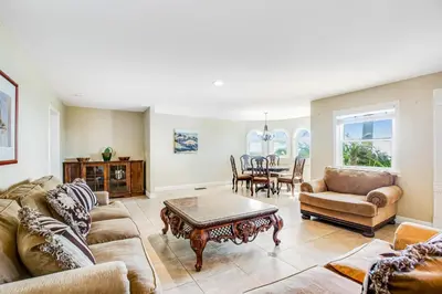 a living room with a couch and a table at F-73 Terramar Cliffs in Carlsbad