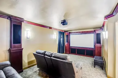 a living room with a couch and a screen at F-73 Terramar Cliffs in Carlsbad