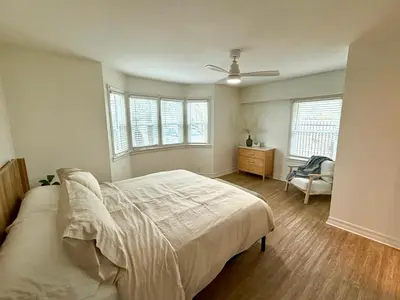 a bedroom with a bed and a ceiling fan at F-73 Terramar Cliffs in Carlsbad