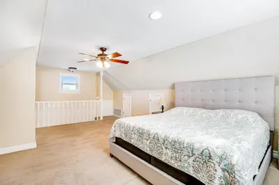a bedroom with a bed and a ceiling fan at F-76 Terramar Cliffs in Carlsbad