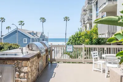 a balcony with a sink and a view of the beach at Walk to the Beach Pool & Hot Tubs & Gym - A-116 in Oceanside