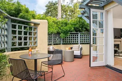 a patio with a table and chairs on a patio at 3BR La Jolla Village Walk to Beach in San Diego