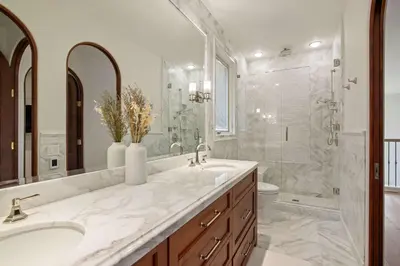 a white bathroom with a sink and a shower at 3BR La Jolla Village Walk to Beach in San Diego
