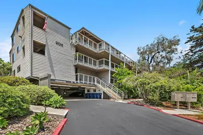 a driveway in front of a building at Surf Song Symphony - SONG55 in Solana Beach