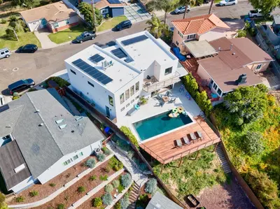 an overhead view of a house with a swimming pool at Luxury Pool Haven Scenic Views and Summer Fireworks in San Diego