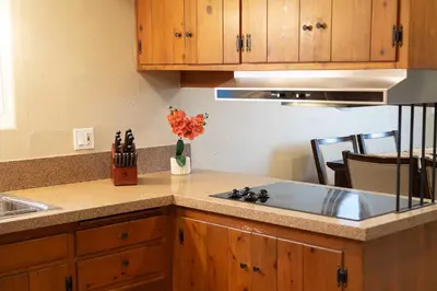 a kitchen with a sink and a counter top at Chic Retreat Ping Pong, Bonfires and Patio Leisure in San Diego