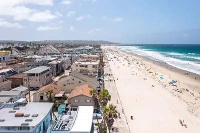 an aerial view of a beach and the ocean at Steps From the Beach & Belmont in San Diego