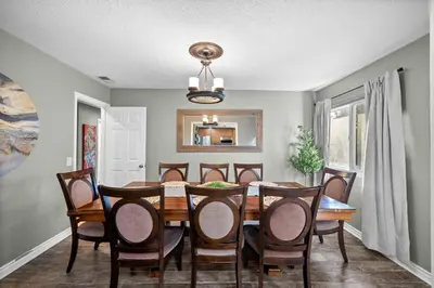 a dining room with a table and chairs at Modern Oceanside Stay with Yard & Laidback Vibes in Oceanside