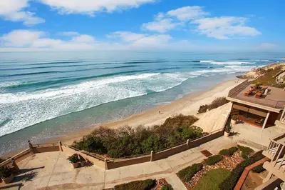 an aerial view of a beach and the ocean at Solana Beach Escape, Beach Access, AC, Pools, Spa, Tennis Courts & Clubhouse Views in Solana Beach