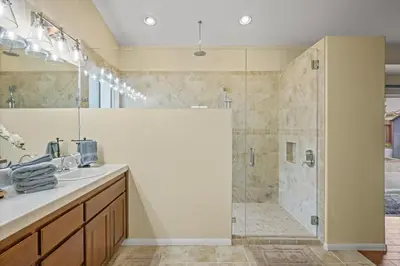 a bathroom with a shower and a sink at Explore Ramonas Vineyards Tranquil Home with Yard in Ramona