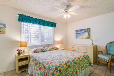 a bedroom with a bed and a window at Family Beach House Steps From Sand W Oceanview Patio By Beachview Rentals in Newport Beach