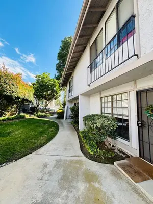 a house with a sidewalk next to a building at Amazing house in La Jolla in San Diego