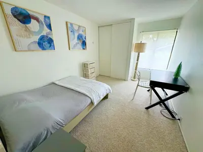 a bedroom with a bed and a desk at Amazing house in La Jolla in San Diego