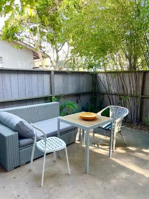 a table and a chair and a table and a bench at Amazing house in La Jolla in San Diego