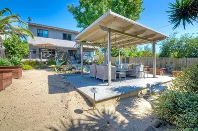 a patio with a pavilion in the backyard of a house at Fresh & Modern 3BR - Just Blocks from Beach in Encinitas