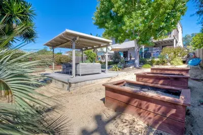 a backyard with a hot tub and a pavilion at Fresh & Modern 3BR - Just Blocks from Beach in Encinitas