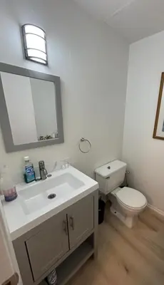 a bathroom with a white sink and a toilet at Amazing House in La Jolla, CA in San Diego