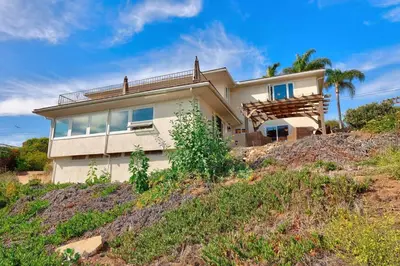 a house sitting on top of a hill at Luxury View Home Perfect for SD Getaway Sleeps 12 in La Mesa