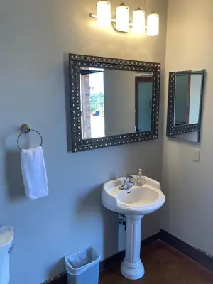 a bathroom with a sink and a mirror at Casita Vino Dog-Friendly Vineyard Retreat & Stay in Escondido