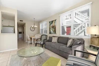 a living room with a couch and a table at 3Br Oceanview W Prime Peninsula Location Near Beach By Beachview Rentals in Newport Beach