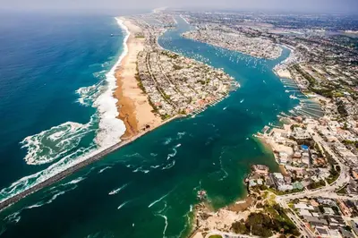 an aerial view of a beach and the ocean at Cozy Family Beach Home Half Block To Popular 44Th St Beach By Beachview Rentals in Newport Beach