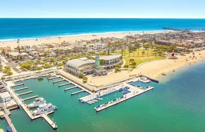 an aerial view of a beach with a marina at Cozy 2Br W Large Deck, Steps From Marina Park And Beach By Beachview Rentals in Newport Beach