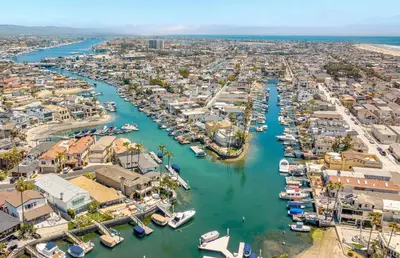 an aerial view of a harbor with boats in the water at Affordable 2Br, Central Location, Walk To Beach And Dining By Beachview Rentals in Newport Beach